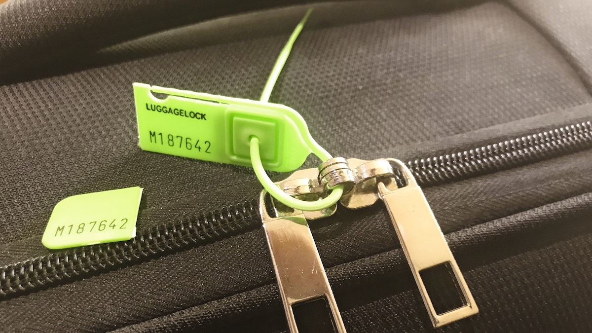 LuggageLock sealed with tear off tab