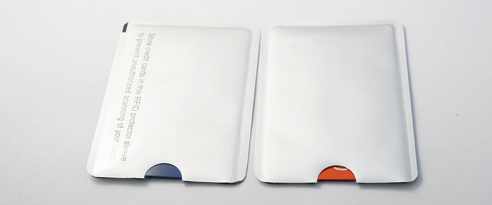 Standard credit card will fit within the sleeve.